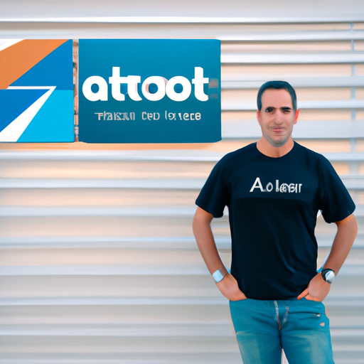 A photo of the Israeli tech entrepreneur in his current day, proudly standing in front of a tech company's logo.